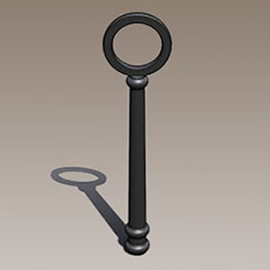 Black metal pole with circular top on a beige background
