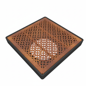 Square wooden coaster with lattice pattern on a white background